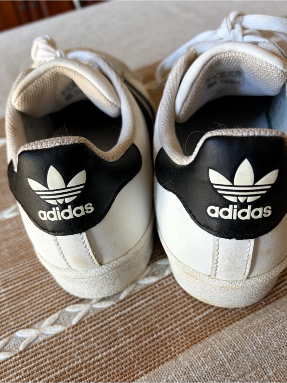 adidas White Sneakers with Black Stripes and Gold Tongue Logo